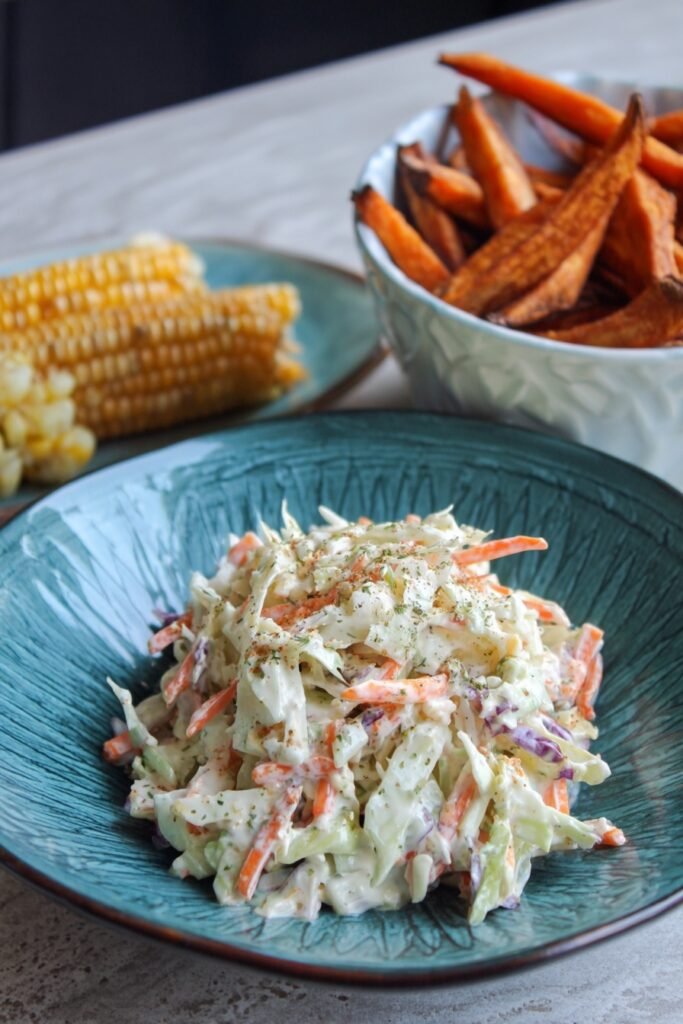 homemade coleslaw, side salad, Sweet potato fries and Corn on the cob